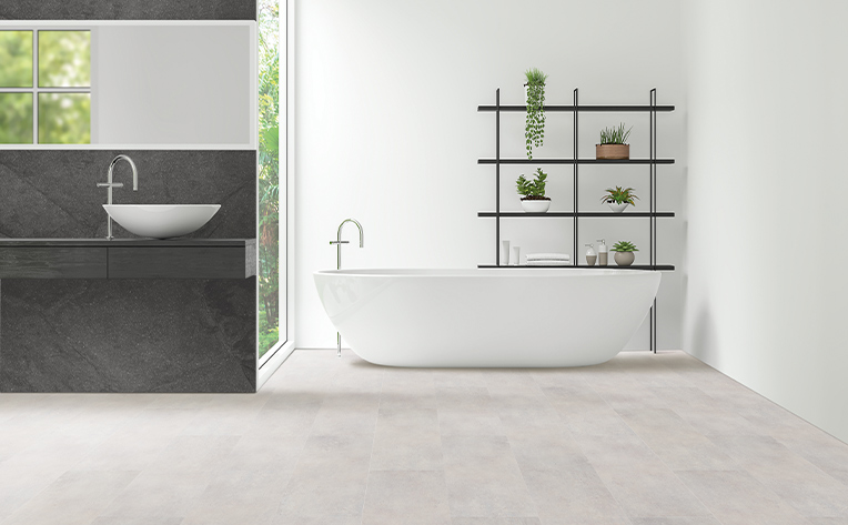 vinyl flooring in bathroom with bath tub